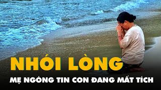 Nhói lòng bức ảnh mẹ quỳ sụp trên bờ biển ngóng tin con đang mất tích