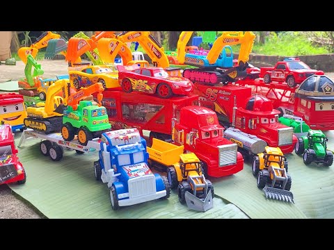 tìm xe đồ chơi , xe container chở ôtô máy xúc , xe tải , xe bồn trộn bê tông , xe cứu hỏa, xe cẩu
