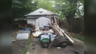 5pm: Look at yard of Ariel Castro's home