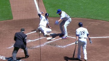 CHC@MIL: Nieuwenhuis crosses home on a wild pitch