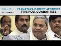 What are the five poll guarantees approved by the Karnataka Cabinet?