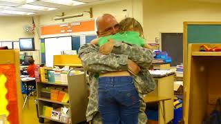 Daddy surprises daughter at school after deployment 2010.