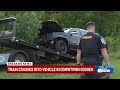 Police officers respond to a train accident in Goshen