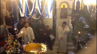 GREEK PRIEST SINGING IT IN THE RAIN