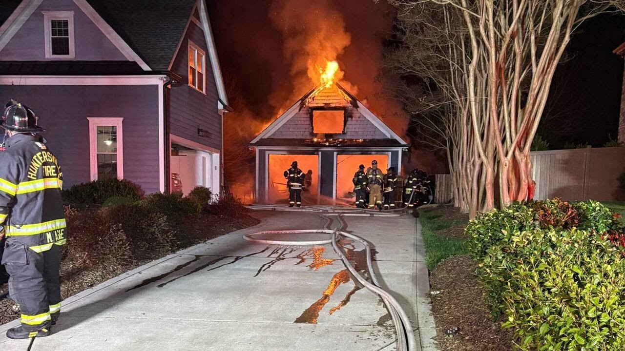 Photos: Garage declared total loss after catching fire in Huntersville ...
