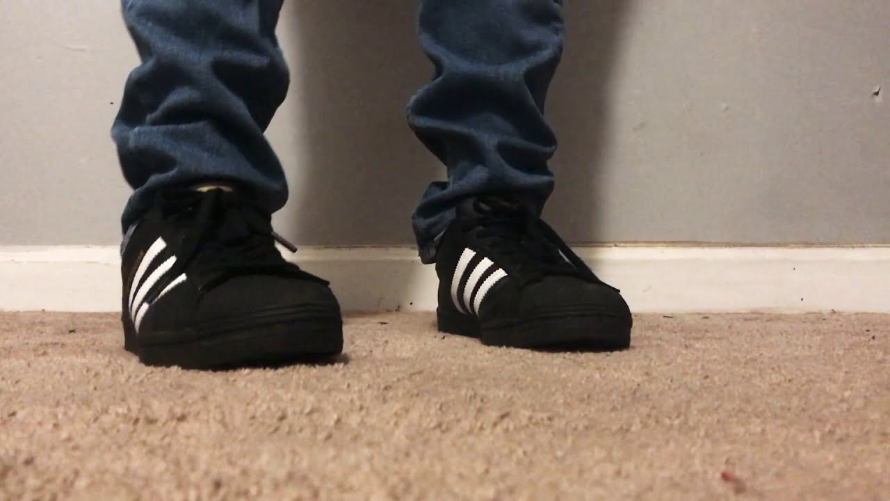 black adidas super stars on feet - YouTube