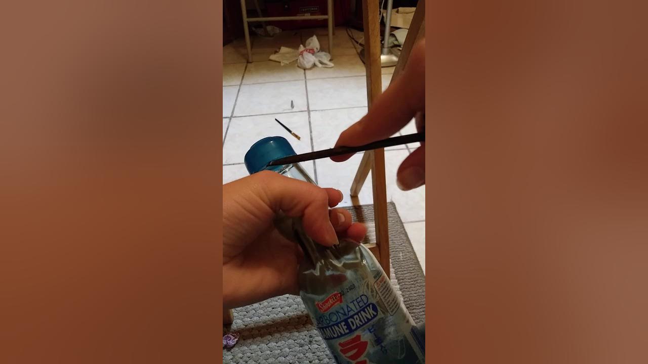 How to get the ball out of a Ramune bottle drink thingy YouTube