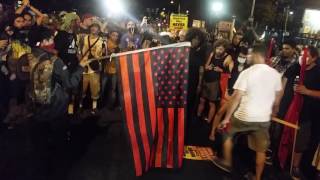 American flag set on fire outside Wells Fargo Centre at Philadelphia DNC- 07.27.16