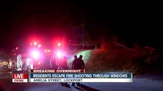 Residents escape fire shooting through windows in Lockport