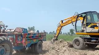 poclain excavator Loading the Sand in the Tractor Trolley Centr Punjab