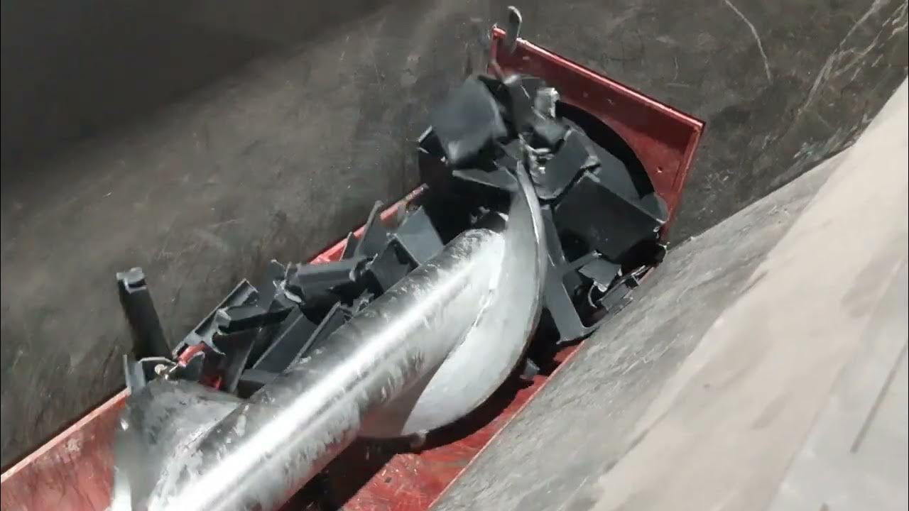 PYTHON Pre shredding Plastic pallets - YouTube