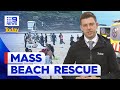 Remarkable mass rescue at popular Sydney beach | 9 News Australia