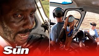 Trucker trapped in Kenyan river rescued by wildlife conservation helicopter crew