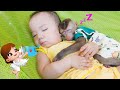 Lovely monkey pupu and baby nguyen go to sleep together in a hammock
