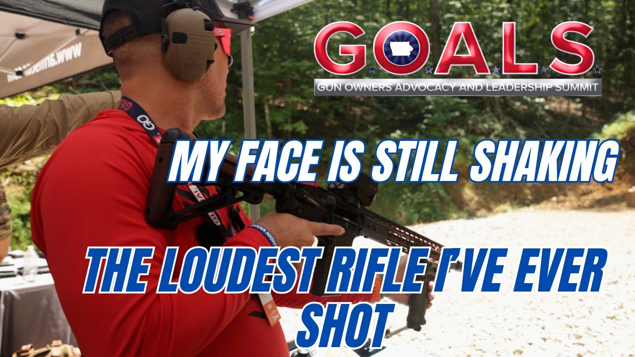 Tactical Playground HQ testing various firearms and optics at the OpticsPlanet table during GOALS 2025, including rimfire and .300 BLK setups, plus a 5.56 rifle with an extremely aggressive muzzle brake causing heavy side blast.