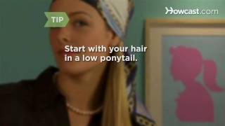 How to Tie a Scarf into a Stylish Head Wrap(Watch more Scarves & Other Accessories videos: http://www.howcast.com/videos/442-How-to-Tie-a-Scarf-into-a-Stylish-Head-Wrap This head wrap is easy to ..., 2010-07-15T20:44:22.000Z)
