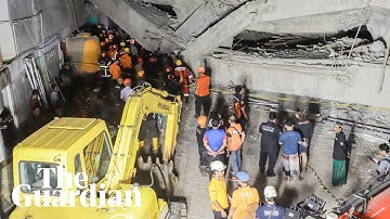 Rescuers race to find survivors after school collapse in Indonesia