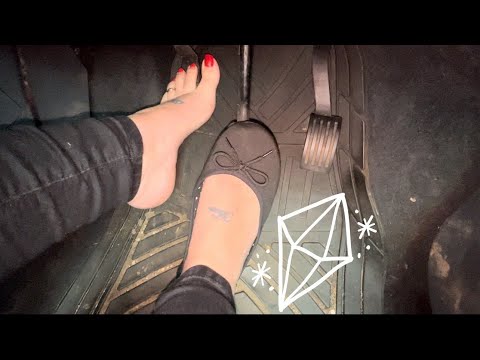 Driving in flats with red nails