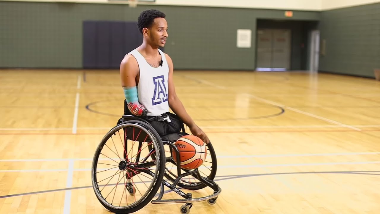 U of A wheelchair basketball player overcomes childhood challenges to  thrive - YouTube