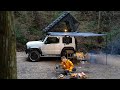 Sudden heavy rain while roasting coffee in the forest. Setting up the rooftop tent and tarp