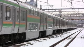 雪の西川口駅を通過・発車する211系、E231系、E233系