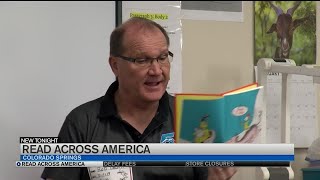 Rob Quirk celebrates with Dr. Suess