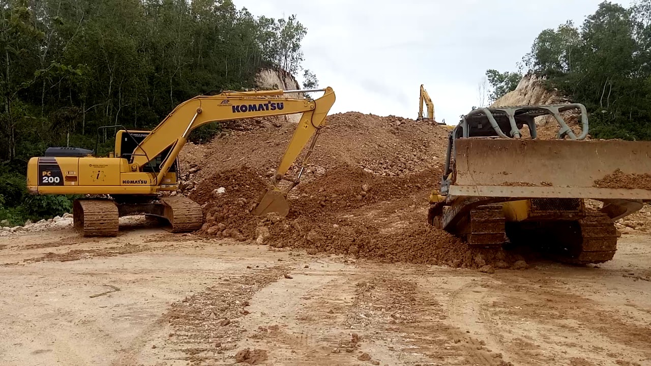 bulldozers, vibrators & excavators, busy working