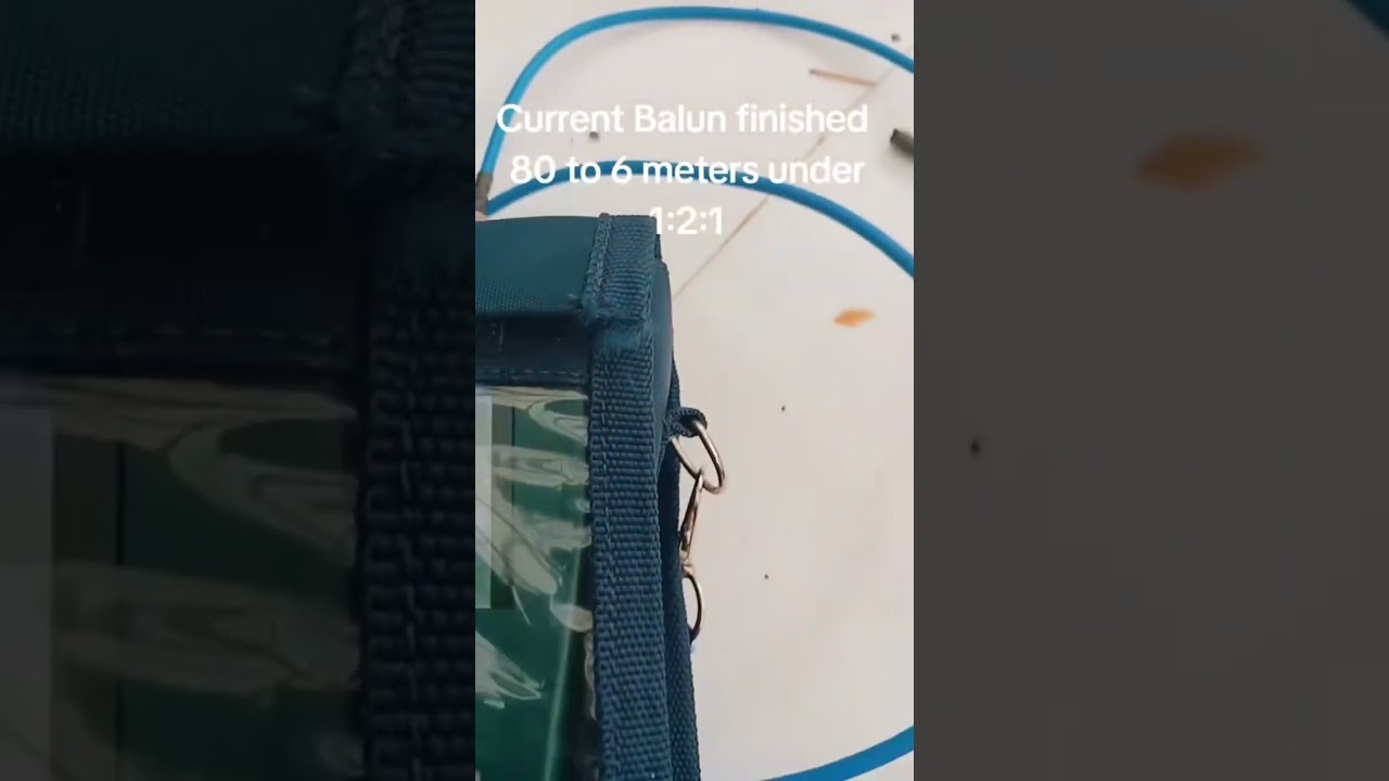 1:1current Balun fitted mounted tested using a 243:43 Toroid.hot glued adjust for best SWR