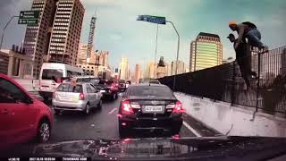 Travellers are trapped when carjackers climb onto morumbi bridge, sao
paulo, smash car windows and help themselves to the drivers
possessions. ensure your sa...