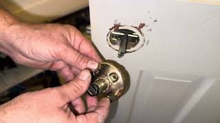 Reinstalling a bathroom doorknob handle Quickset door lock