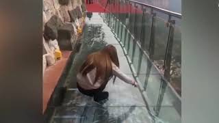 People are terrified to cross glass bridge   Glass bridge crack effect   Glass bridge funny moments