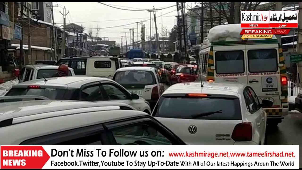 Harsh winter, uncleand snow roads causes traffic mess, ambulance stuck in traffic jam