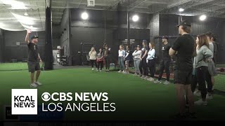 Long Beach baseball moms learn power of supportive cheering from professional athletes