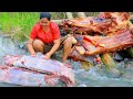 survival in the rainforest - Women pick Beef bone for food  - Cooking  Beef bone Eating delicious