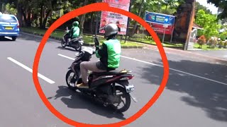 Playing with Phone While Riding a Motorbike