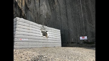 World-record impact on Reinforced Earth® rockfall bund: Slender footprint for protective structures