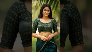 Beautiful Indian Woman In Traditional Green Saree With Elegant Jewelry