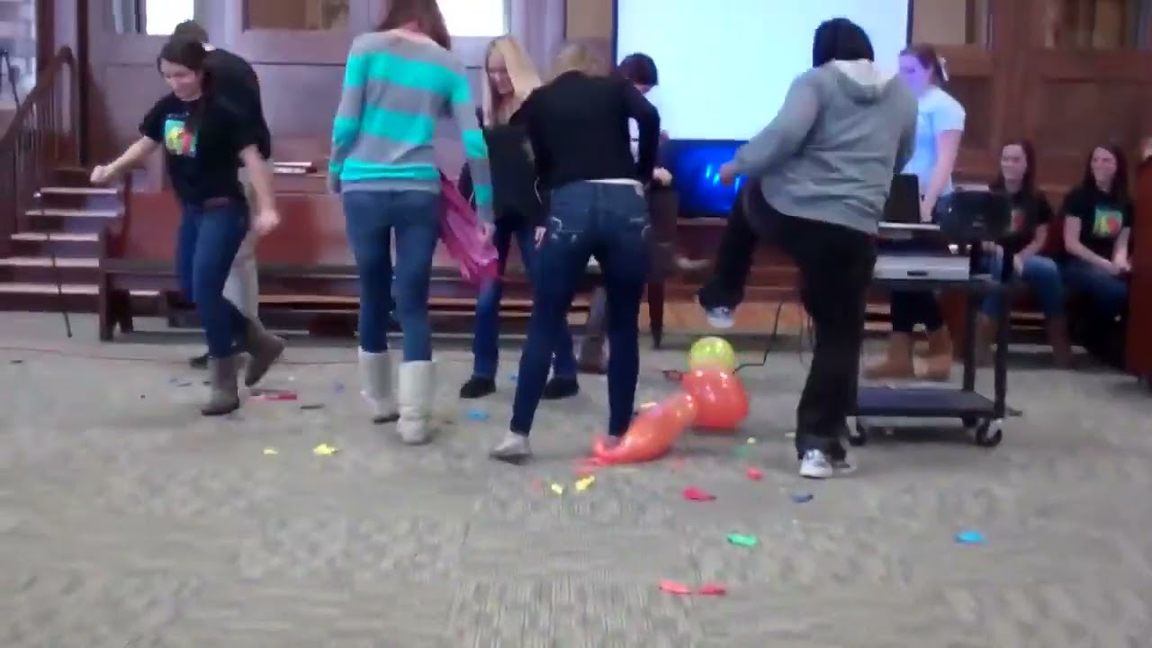 Group of People Stomping Balloons / Looner Squad