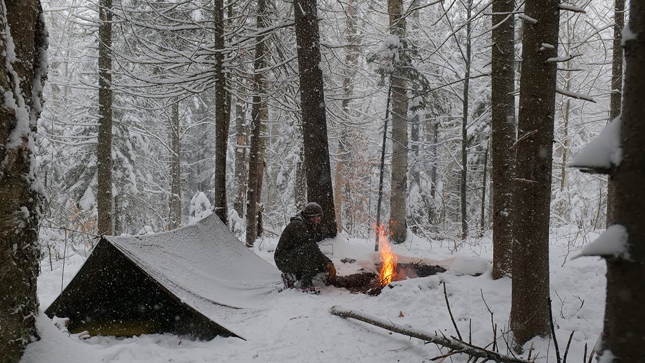 Solo Winter Bushcraft Camp in a Snow Storm 