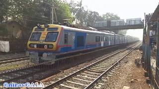 Blue-Grey Mumbai AC local crossing Blue-Grey Karnavati Exp