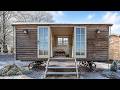 Charming Tiny House on Wheels With Rustic Wood Exterior | Living Design Tiny House