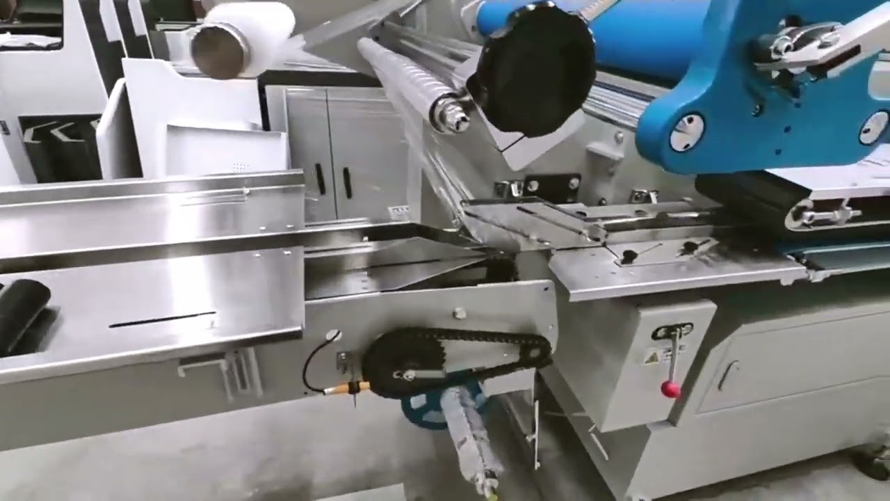 Dustbin bags pillow type wrapping and shrinkage packing machine