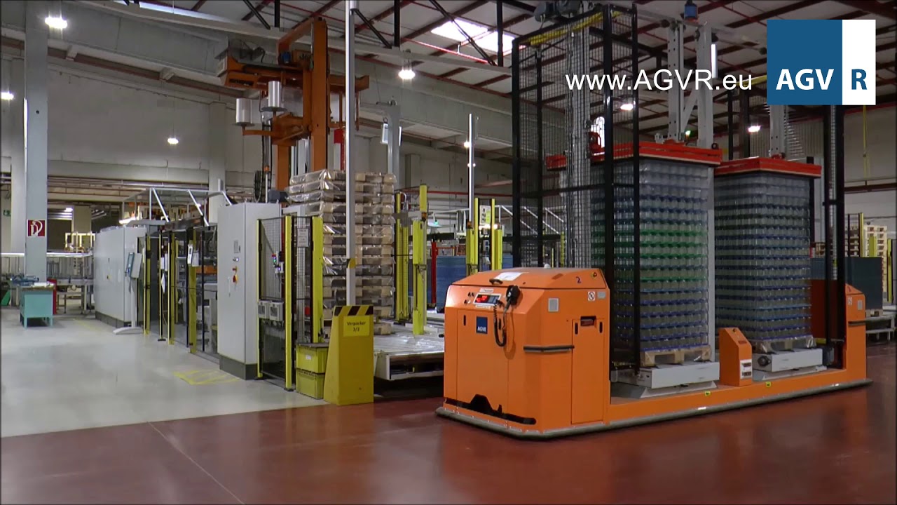 AGVR FLQ 2 x chain conveyor and toppress AGV for pallet handling