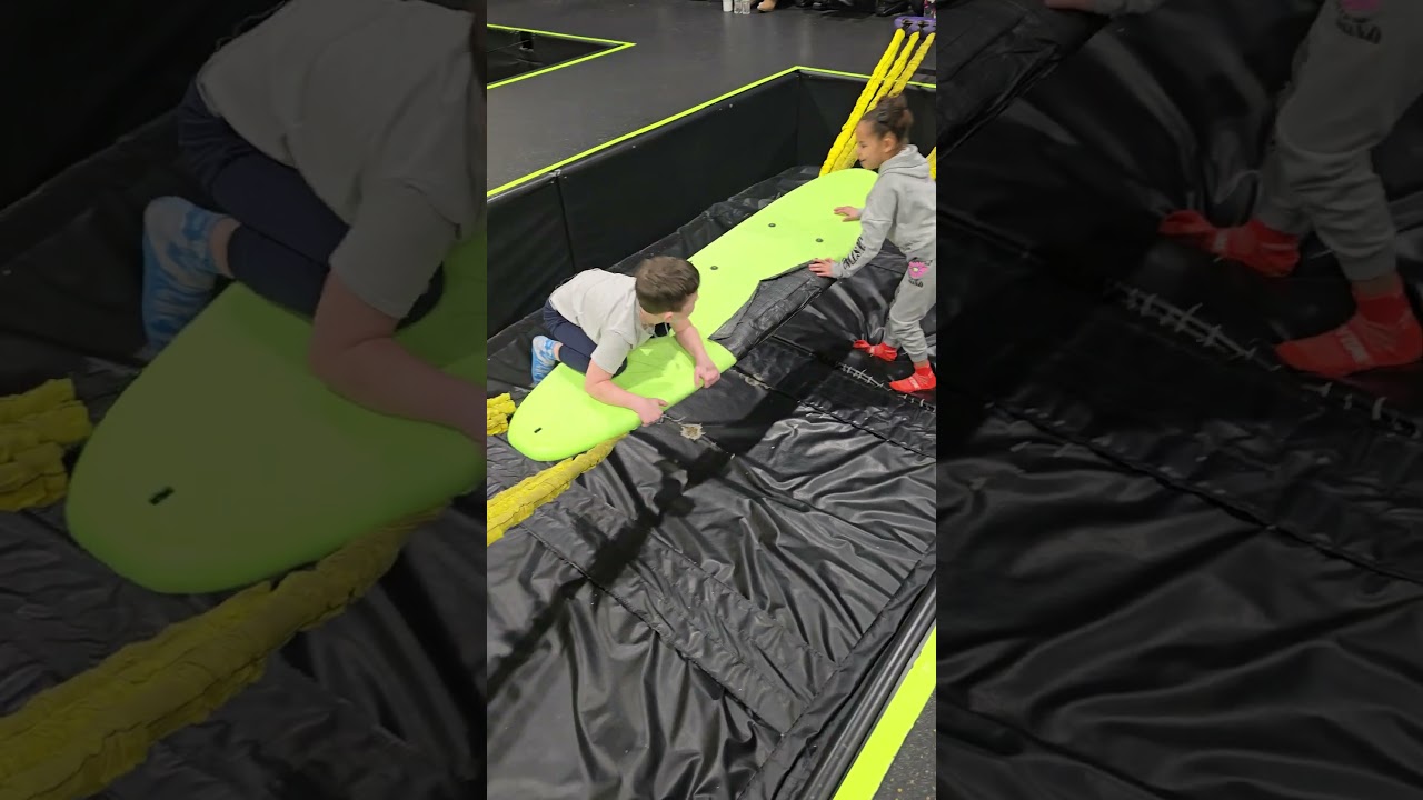 Ayden working on his surfing skills with his best friend 