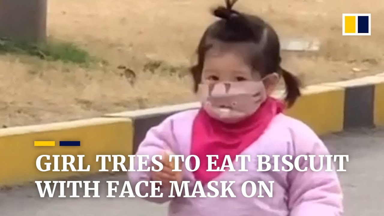 Girl Tries To Eat Biscuit With Face Mask On In China Youtube