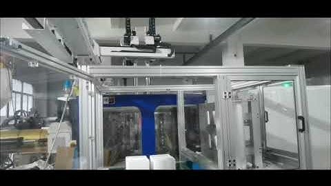 Economical and Practical Top entry type IML Robot Labeling machine for 4 cavites food lids