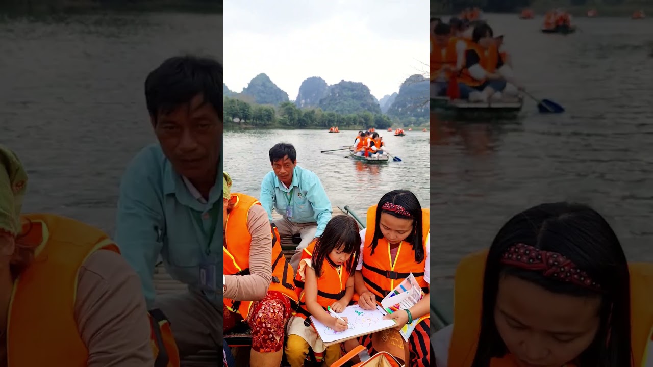 3-year-old kid artist drawing on a boat tour in Ninh Binh, Vietnam | Mia Mai Art