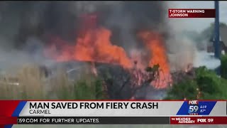 Man pulled from car seconds before it burst into flames