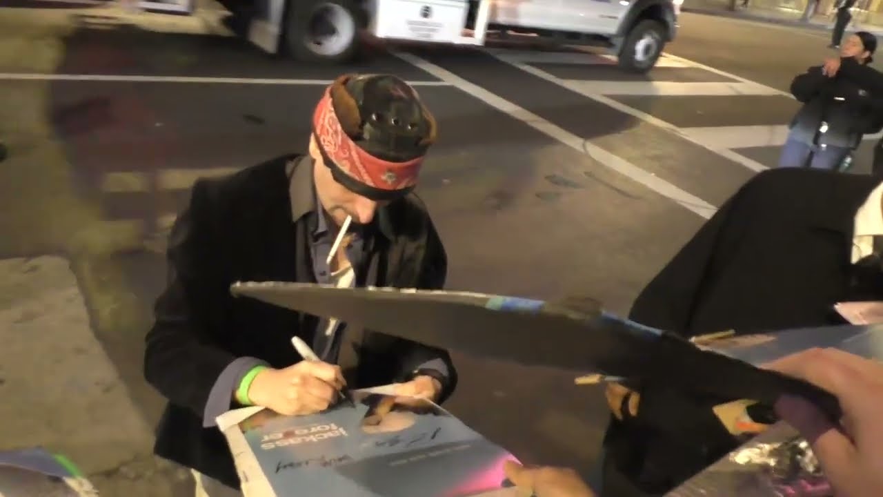Loomis Fall signs autographs at the Jackass Forever Premiere in