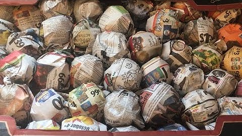 Storing Apples in Newspaper.